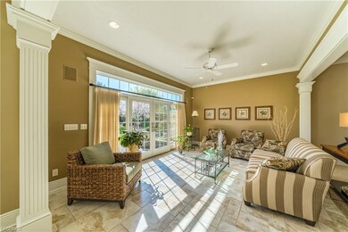 Sun room boasts Italian tile and French doors to p