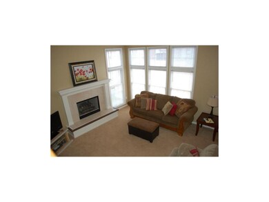 Floor to ceiling windows in living room! Vaulted c