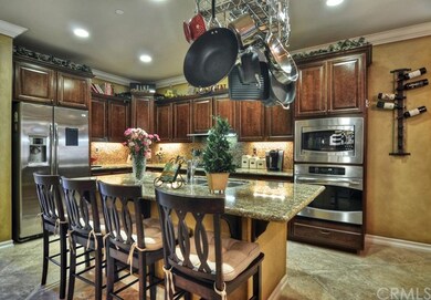 Open Concept Kitchen Featuring Breakfast Bar, Crow