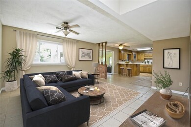 A family room to love, tile throughout great for t