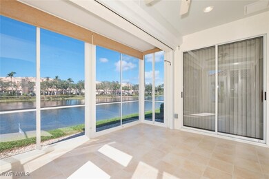 Unfurnished sunroom featuring ceiling fan and a wa