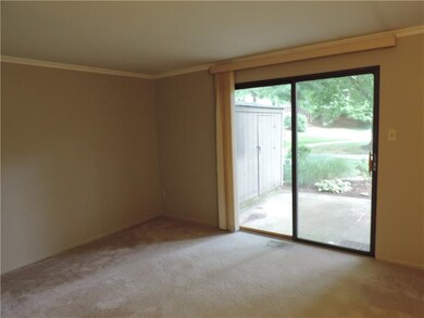 Large living room with walk-out to private patio!