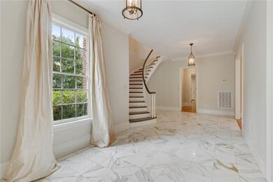Fabulous foyer with curved straircase
