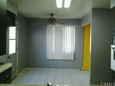 Breakfast area in kitchen, tiled floors, laundry h