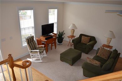 Living area with hardwood floors.