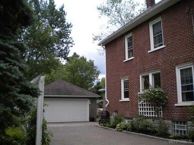 Exterior Front. Two car garage is approximately 10