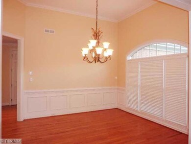 Dining Room. Great color, hardwood floors and natural light.