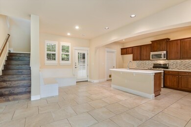 Kitchen with appliances with stainless steel fini