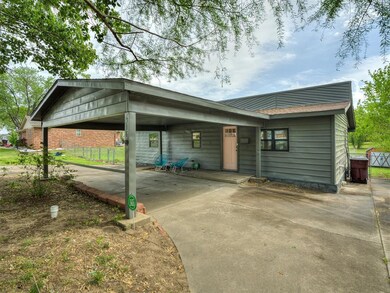 View of front of home with a carport