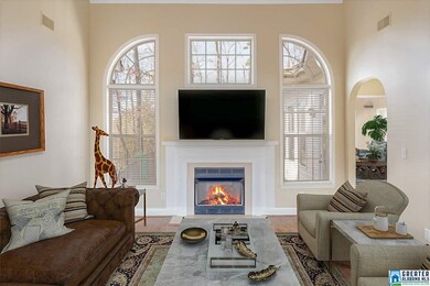 Cozy Fireplace, & Wall of Windows allowing lots of