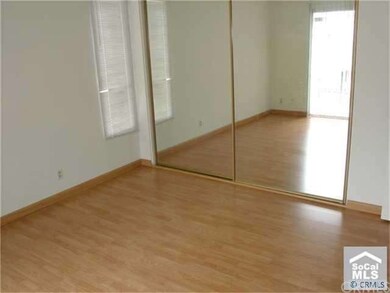 Master Bedroom with Mirrored Wardrobe Doors & Lami
