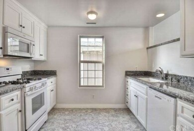 Gorgeous brand new kitchen in upstairs unit!