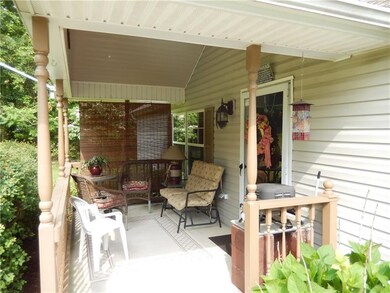Enjoy sitting outside viewing the country setting.