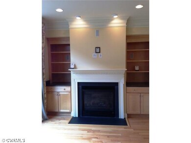 Living Room - Stunning built in bookcases with gas fireplace