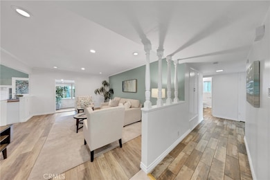 Walk into the living room, hallway goes to bedrooms