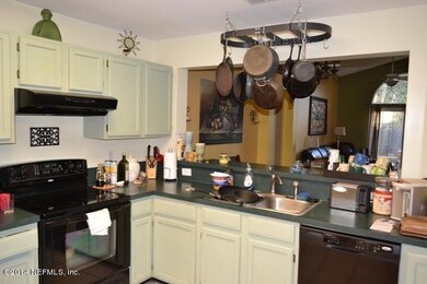 Kitchen overlooks Family Room