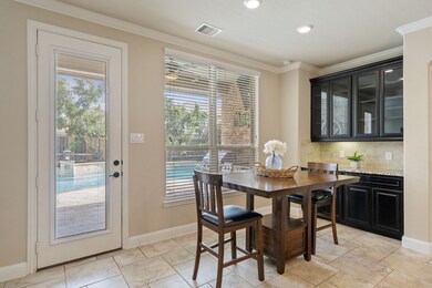Tucked beside large windows, this charming nook of