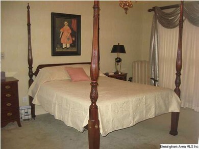 master bedroom on main level  with large bath and 