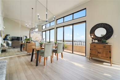 Vaulted wall with mirrors provides added views of