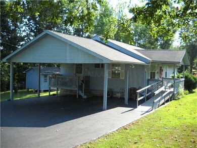 Side view of carport & drive