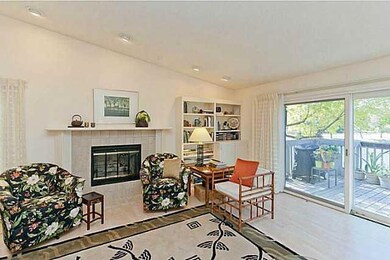 Other. Living room with   a warm fireplace and acc