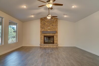 Family Room with Rock gas fireplace