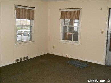 Living Room. Living Room with hardwood floors unde