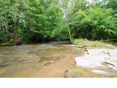 Perfect place to get your feet wet and wade the creek.. be careful.. slippery : )