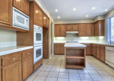 Kitchen features upgraded appliances including dou