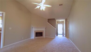 Wood Burning Fireplace and Vaulted Ceiling.