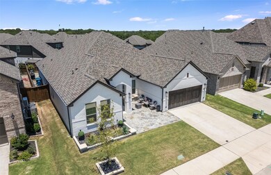 View of front facade featuring a front lawn and a 