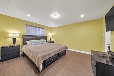 Furnished Bedroom with TV