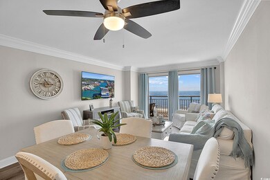 Dining room featuring baseboards, crown molding, a