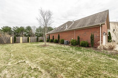 Side View of Property in Cul-de-sac and Wooden Privacy Fenced Back Yard.