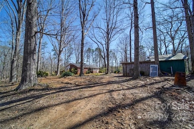 Small building to be torn down prior to closing.