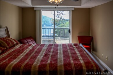 Different view of main level master bedroom and la