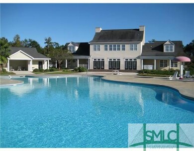 Exterior Front. SWIMMING POOL BEHIND CLUBHOUSE