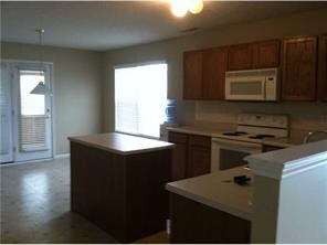 Kitchen. Eat in kitchen with center island and all appliances,