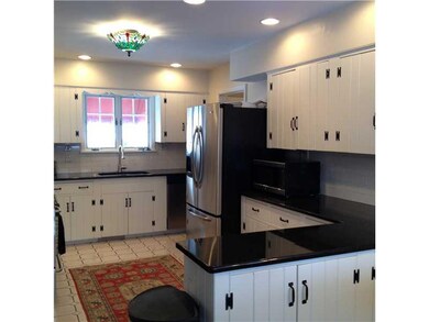 Kitchen. Upgraded kitchen. Small eating area also.