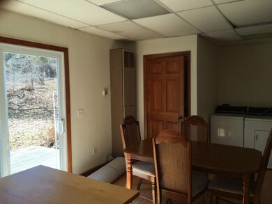 Laundry area and door to power room