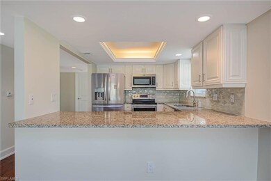 View of kitchen from Dining room & Living room