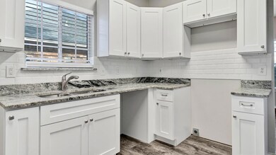 Kitchen with new cabinets, granite counter tops, b
