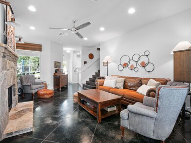 Living room with ceiling fan, recessed lighting, 