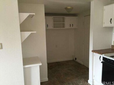 Full sized laundry hook ups just off the kitchen. 