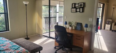View of carpeted home office
