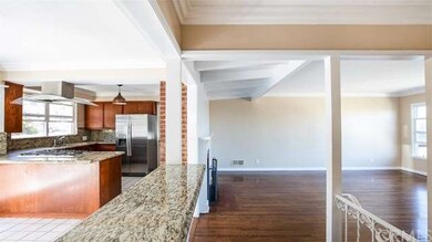 FROM ENTRY AREA TOWARDS KITCHEN/DINING AND LIVING 