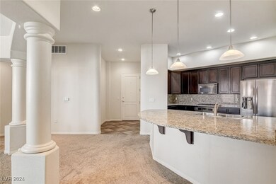 Foyer that opens to the kitchen and dining area