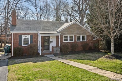 View of front of property with a front lawn