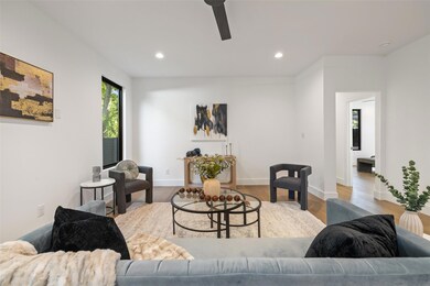 Living area featuring ceiling fan, recessed light