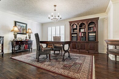 As you enter the foyer, you'll find the study on your right, which could also serve as a formal living space